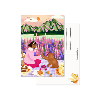 Postcard - woman with dog picnicking mountains and flowers