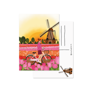 Postcard - woman with bicycle in tulip fields Amsterdam